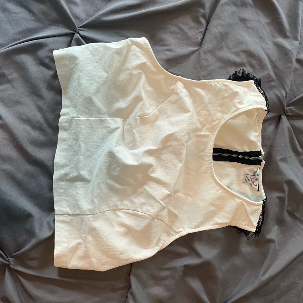 White Sleeveless Top with Black Trim